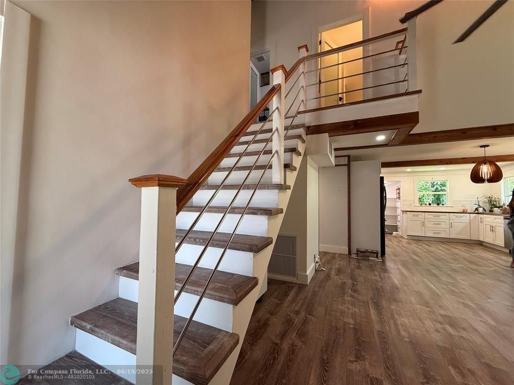 22990 Southwest 156th Avenue Miami, FL 33170 - Photo 33 of 41 a view of entryway and hall with wooden floor
