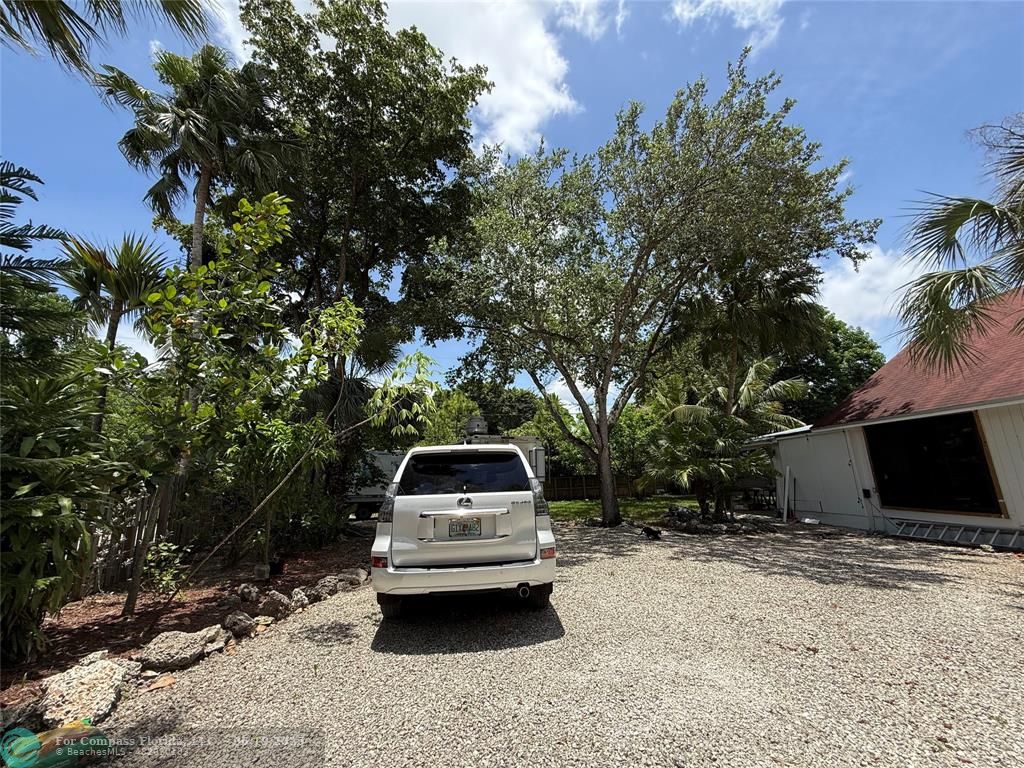 22990 Southwest 156th Avenue Miami, FL 33170 - Photo 4 of 41 a view of a backyard with a sink and outdoor space