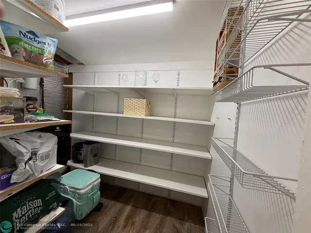 a room with window and furniture