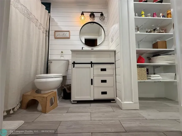 a bathroom with a sink and a toilet