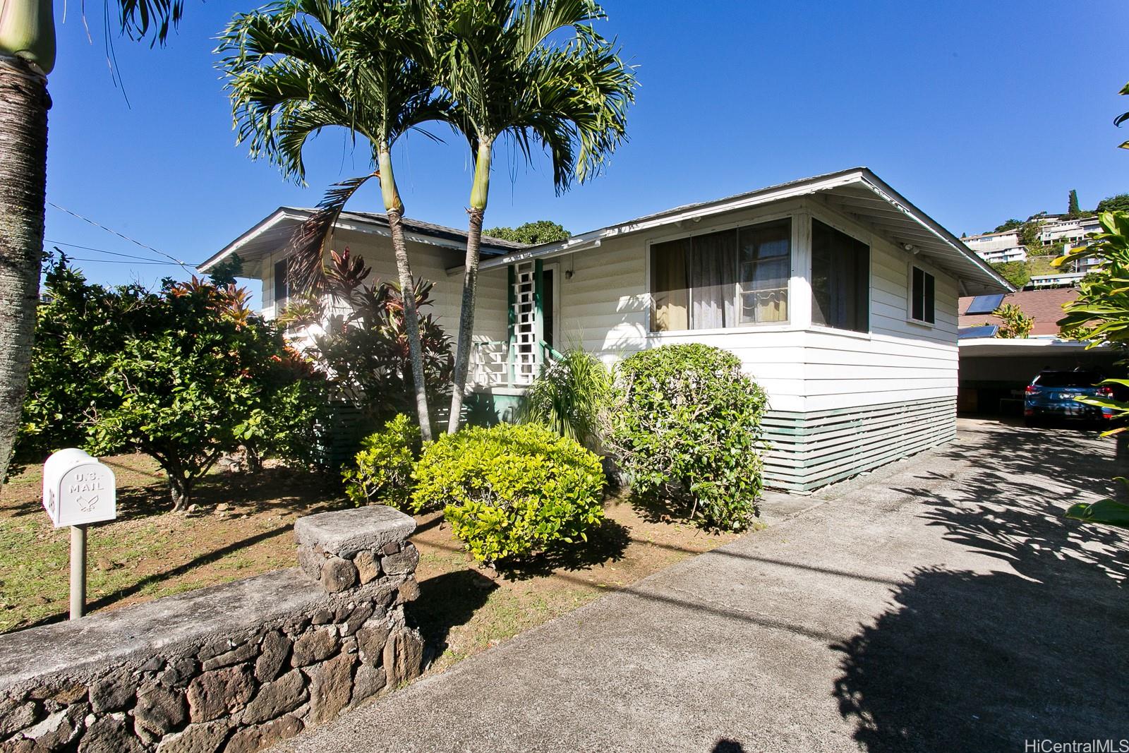 2454 Pauoa Road Honolulu, HI 96813 - Photo 1 of 1 a front view of a house with a yard