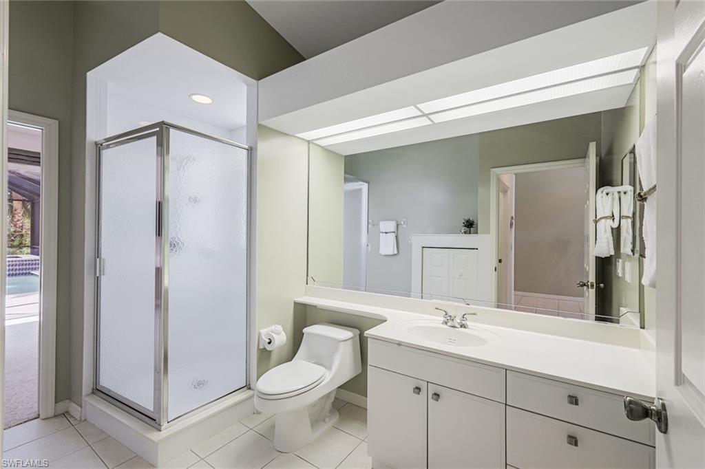 10221 Cape Roman Road, Unit 102 Estero, FL 34135 - Photo 18 of 49 Guest Bathroom w/ Access From Bed 3 & Hall Area