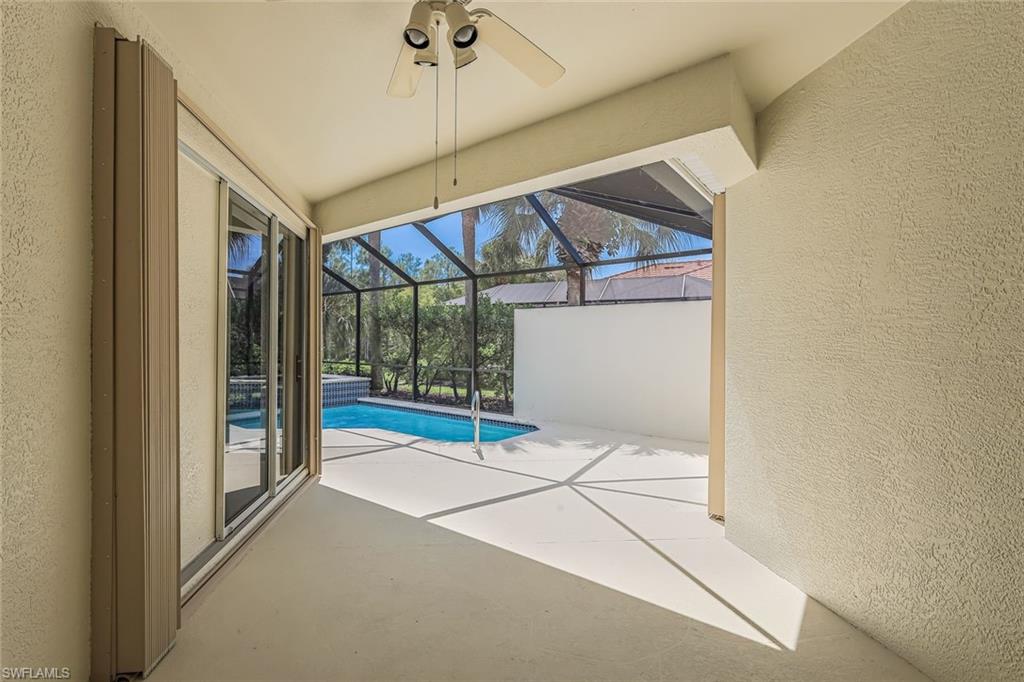 10221 Cape Roman Road, Unit 102 Estero, FL 34135 - Photo 20 of 49 Covered Area of Lanai w/ Pool/Spa.