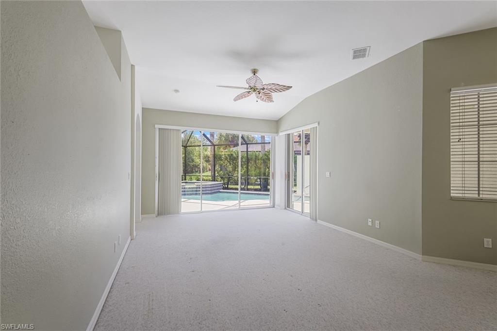 10221 Cape Roman Road, Unit 102 Estero, FL 34135 - Photo 3 of 49 Living Room