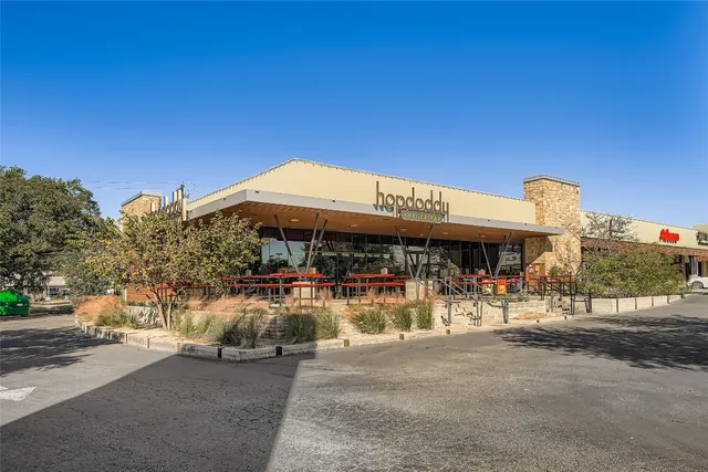 a view of a street with cars