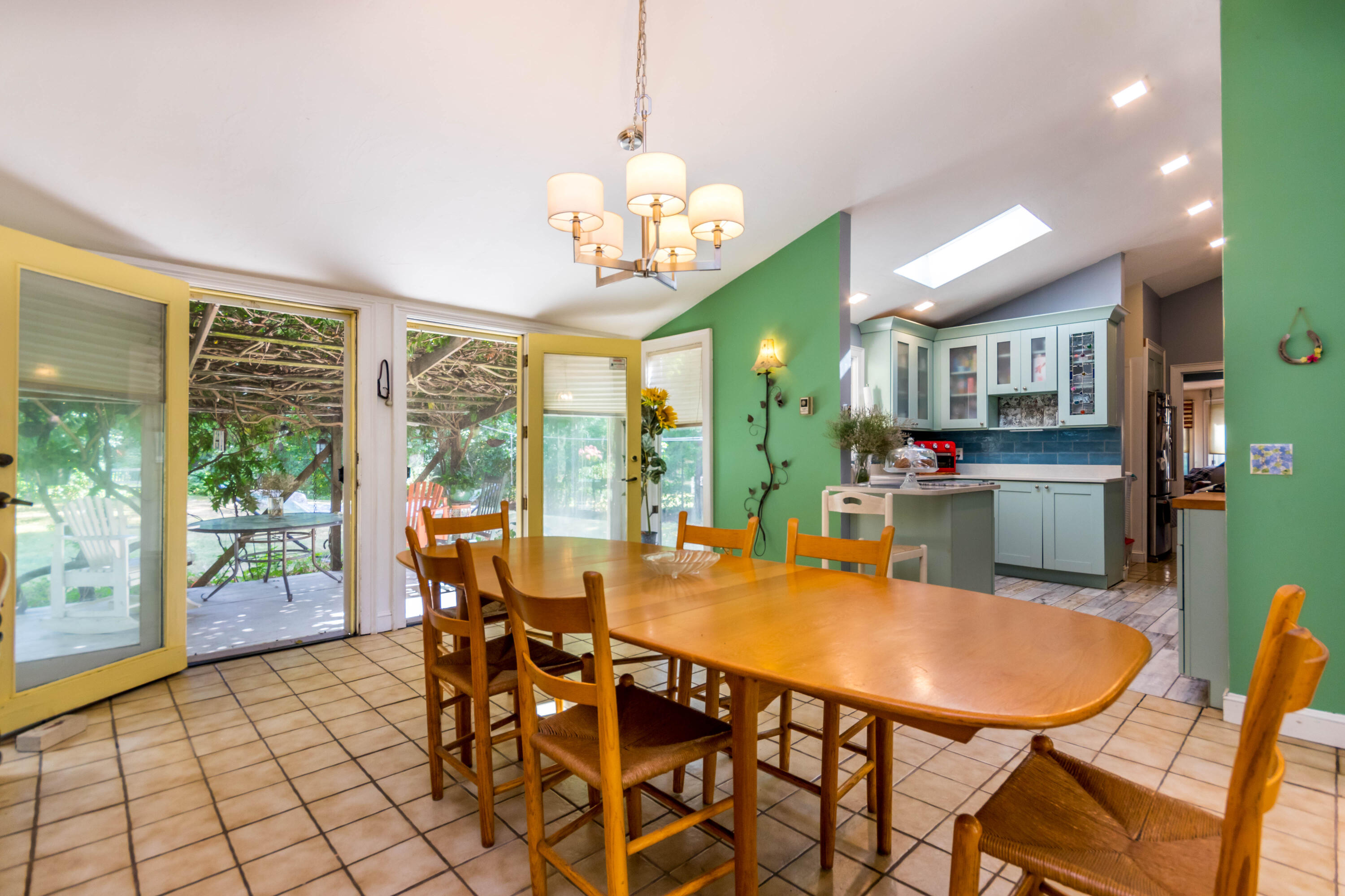 305 County Road Monument Beach, MA 02532 - Photo 10 of 34 a dining room with furniture a chandelier and window
