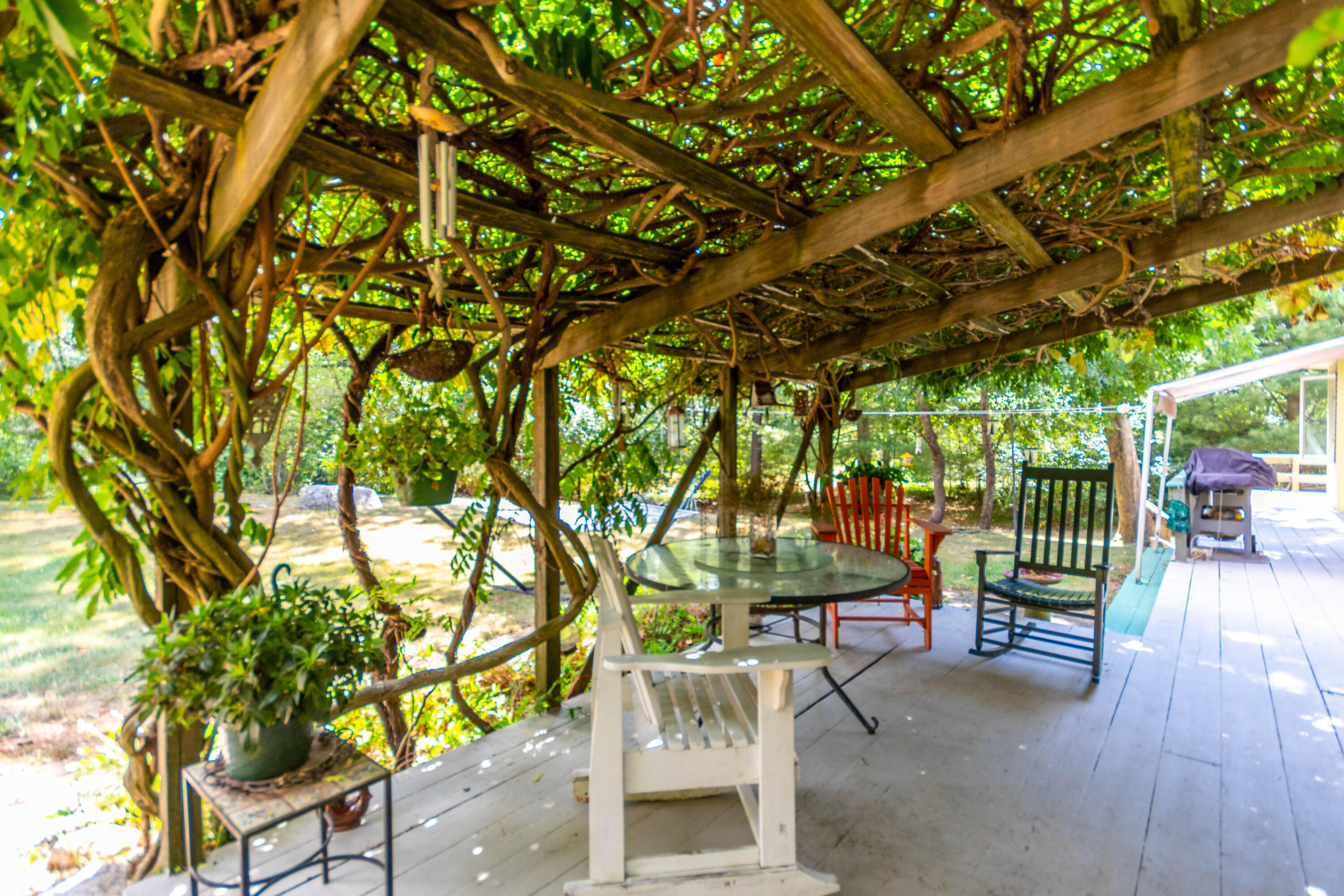305 County Road Monument Beach, MA 02532 - Photo 28 of 34 a garden view with a seating space