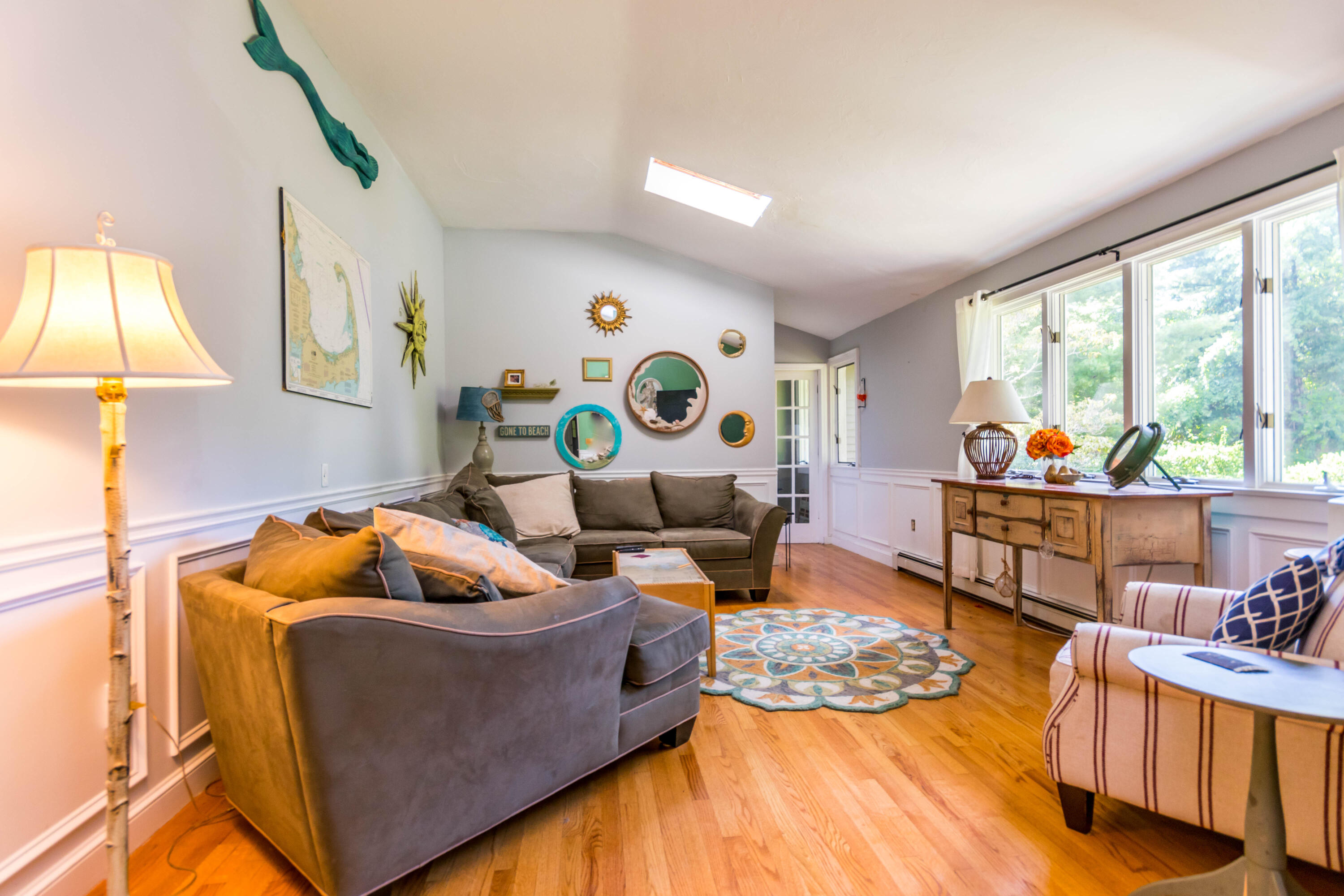 305 County Road Monument Beach, MA 02532 - Photo 5 of 34 a living room with furniture and a large window
