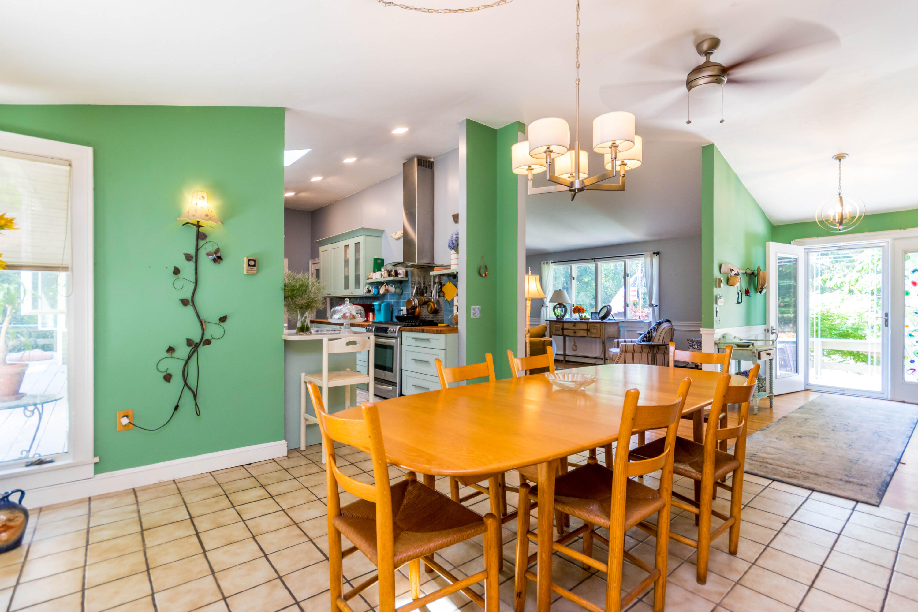 305 County Road Monument Beach, MA 02532 - Photo 7 of 34 a dining room filled with lots of furniture and a chandelier
