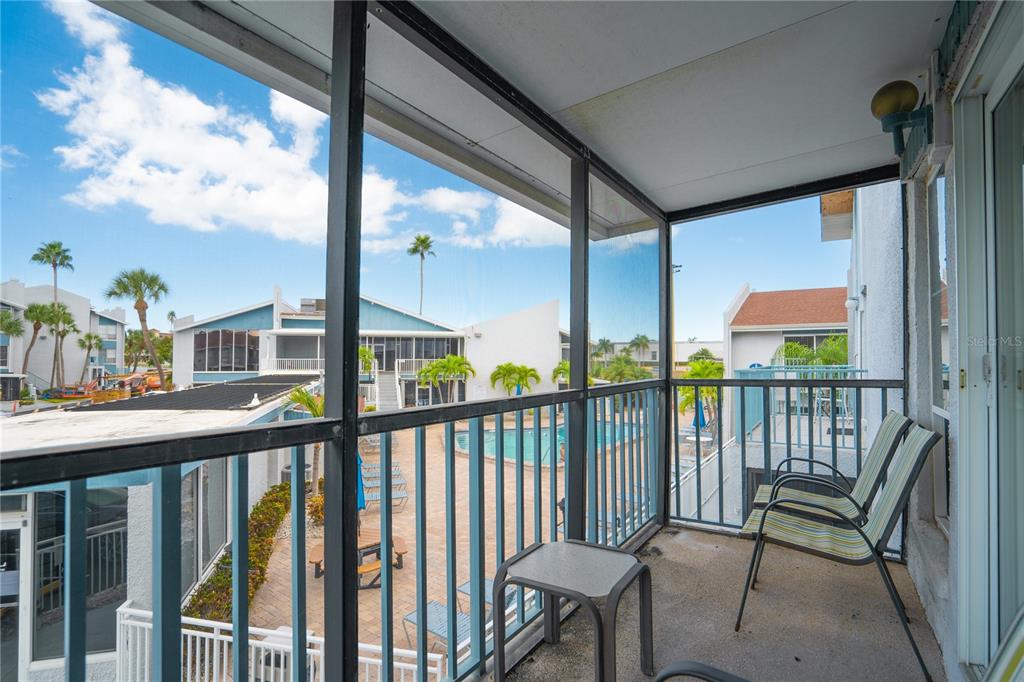 230 Medallion Boulevard, Unit E Madeira Beach, FL 33708 - Photo 21 of 35 a view of a city from a balcony