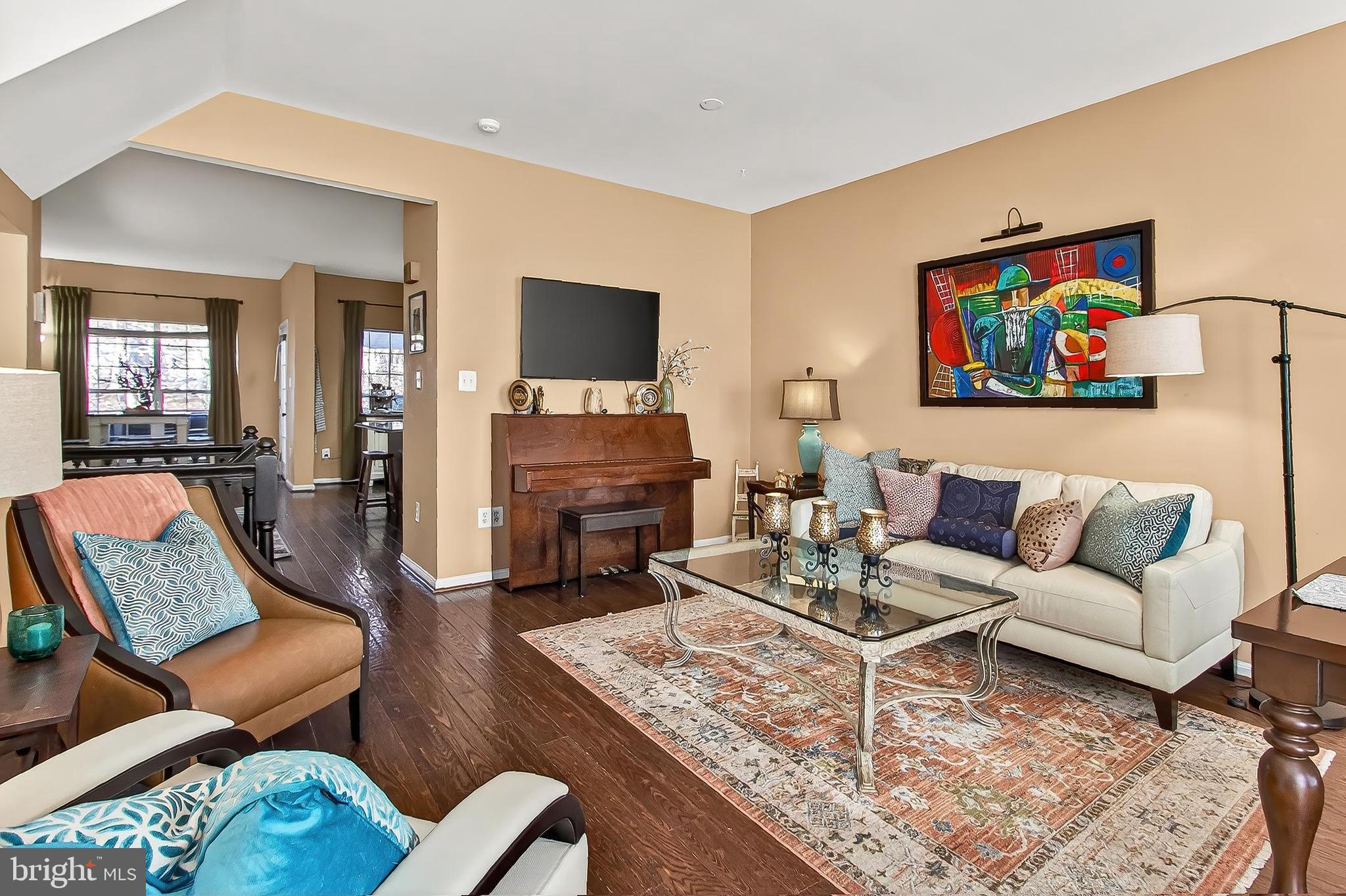8445 Carmela Circle Springfield, VA 22153 - Photo 18 of 53 a living room with furniture and a flat screen tv