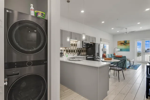a living room with furniture and a table