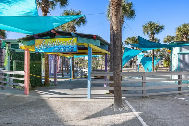 a kitchen with sink and cabinets