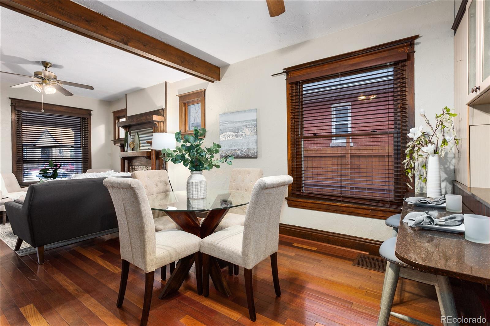 3777 Stuart Street Denver, CO 80212 - Photo 12 of 40 a dining room with furniture and wooden floor