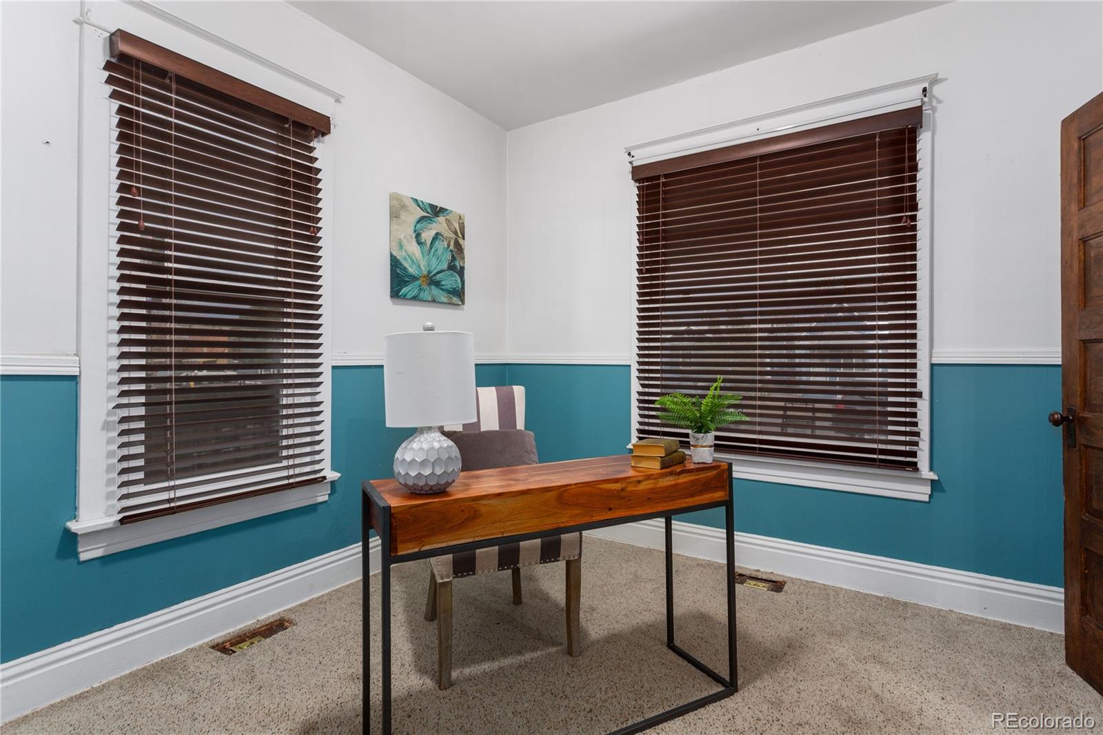 3777 Stuart Street Denver, CO 80212 - Photo 18 of 40 a work room with furniture and a window