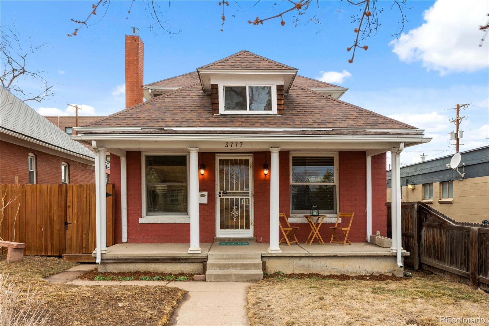 3777 Stuart Street Denver, CO 80212 - Photo 2 of 40 a front view of a house