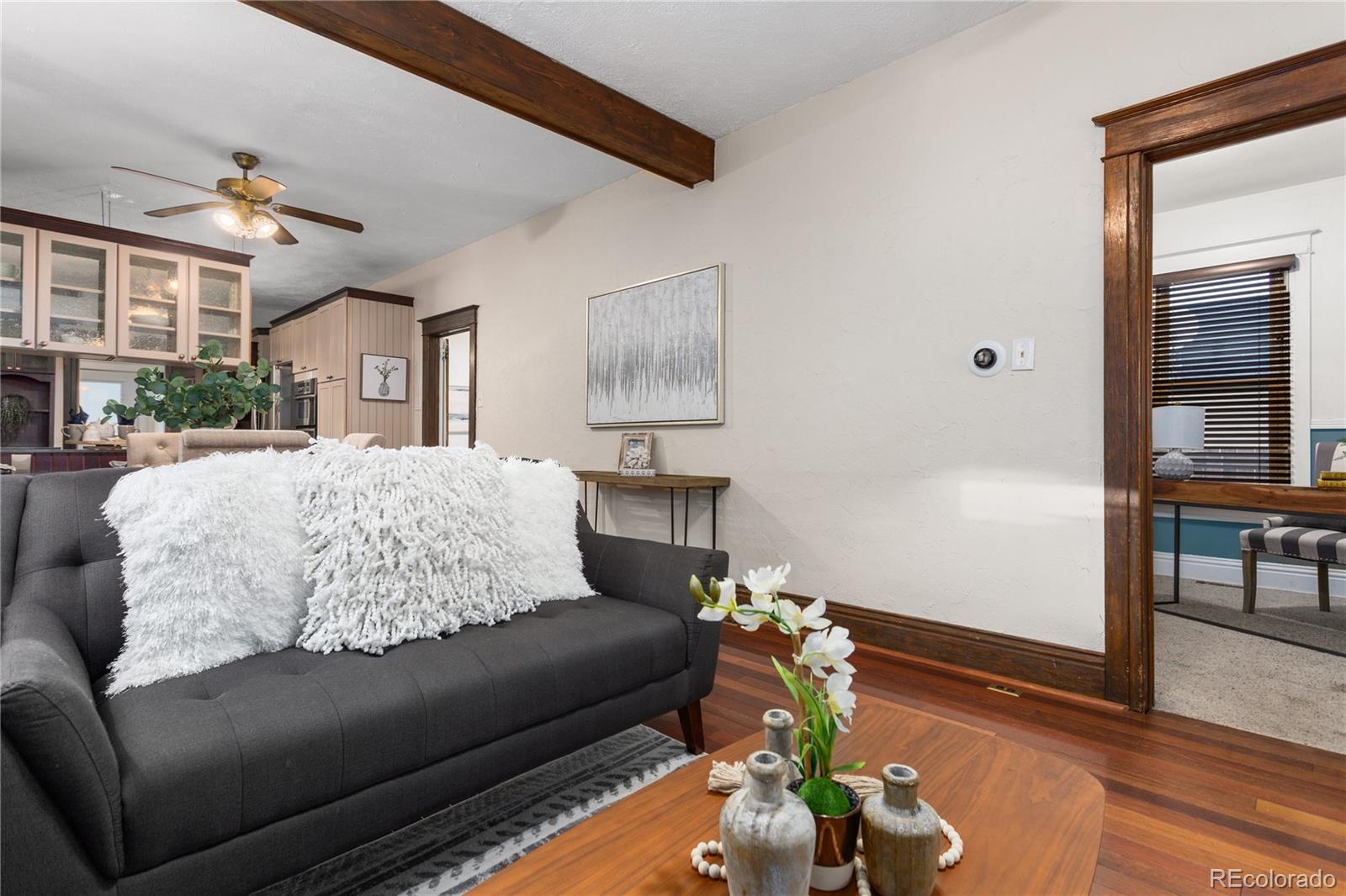 3777 Stuart Street Denver, CO 80212 - Photo 8 of 40 a living room with furniture flowerpot and wooden floor