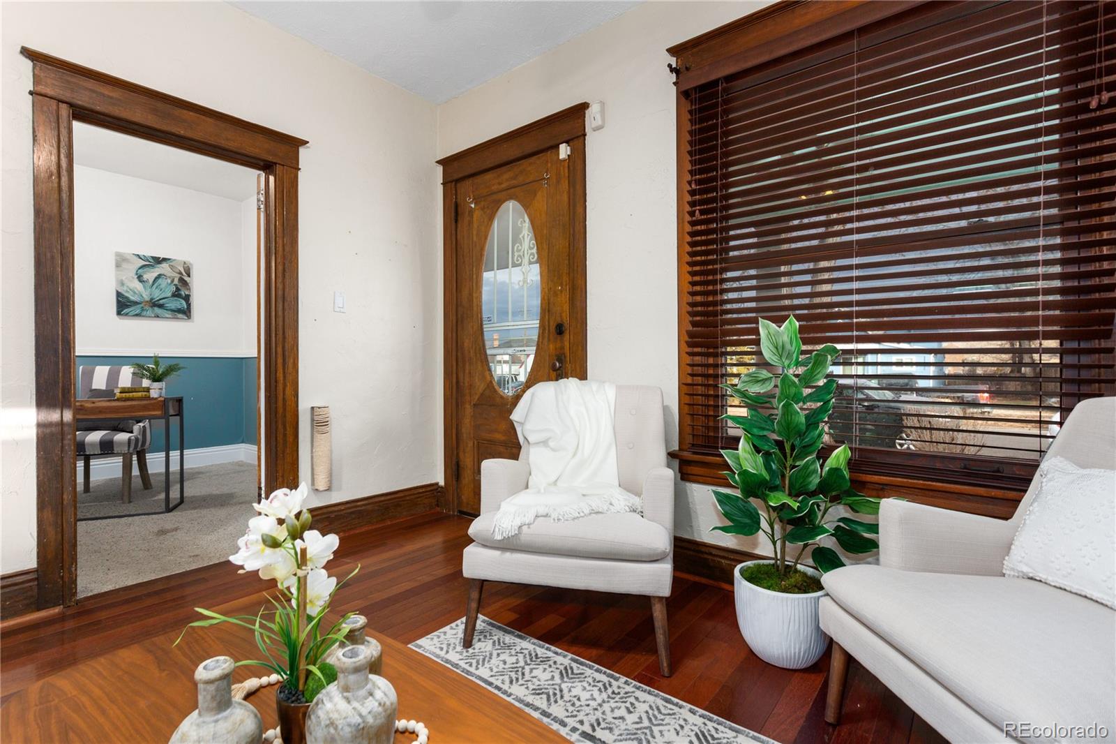 3777 Stuart Street Denver, CO 80212 - Photo 9 of 40 a living room with furniture and a potted plant