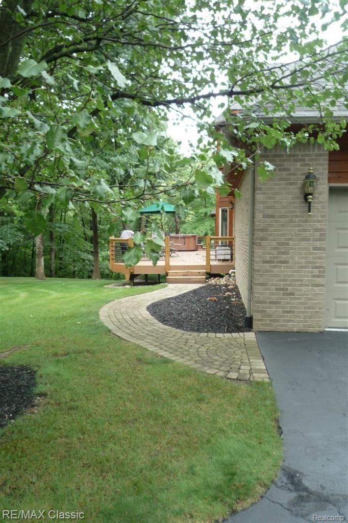 9418 Quail Ridge Run Brighton, MI 48114 - Photo 4 of 20 So Private