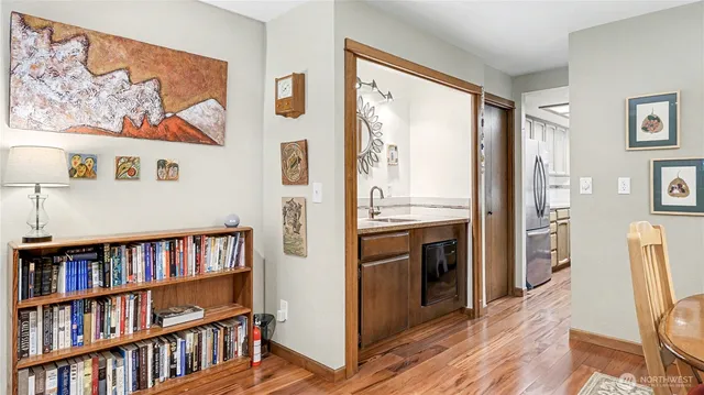 a view of a bedroom with workspace and a window