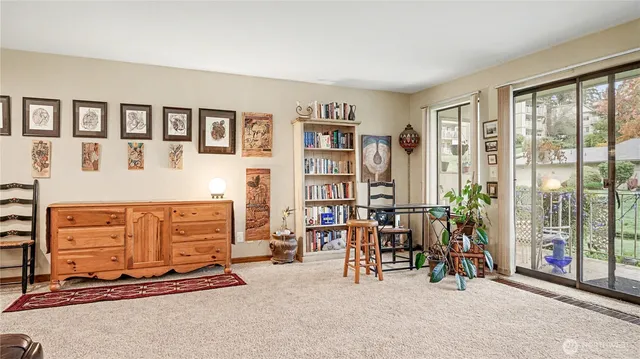 a view of game room with large windows