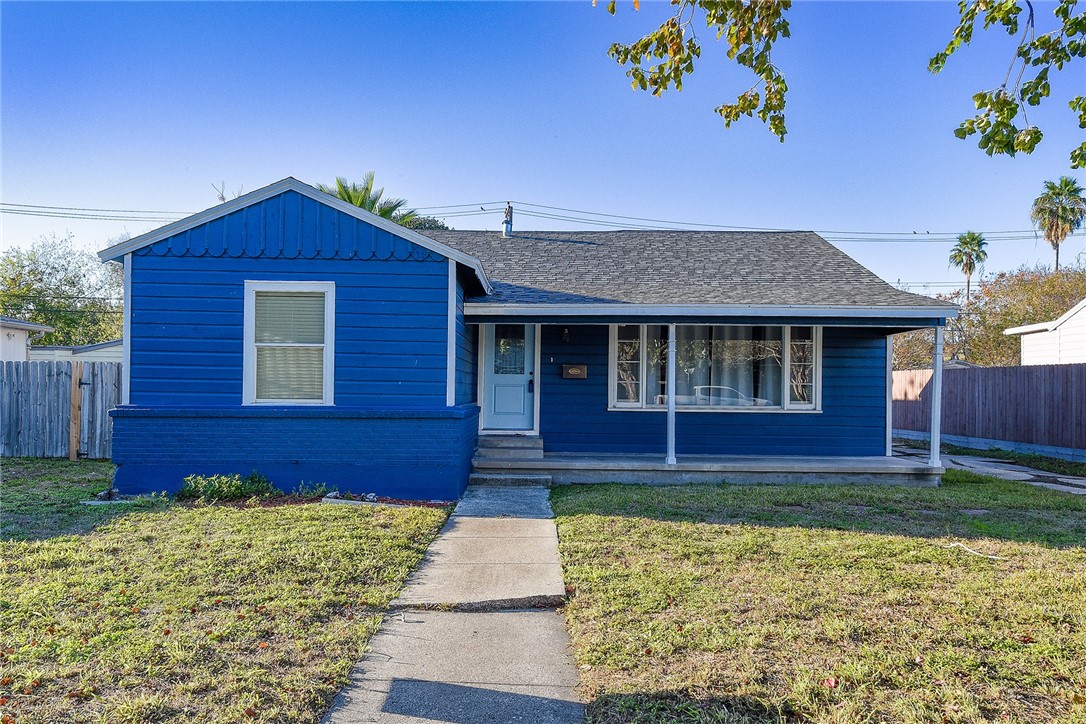 634 Mc Call Street Corpus Christi, TX 78404 - Photo 1 of 34 a front view of a house with garden