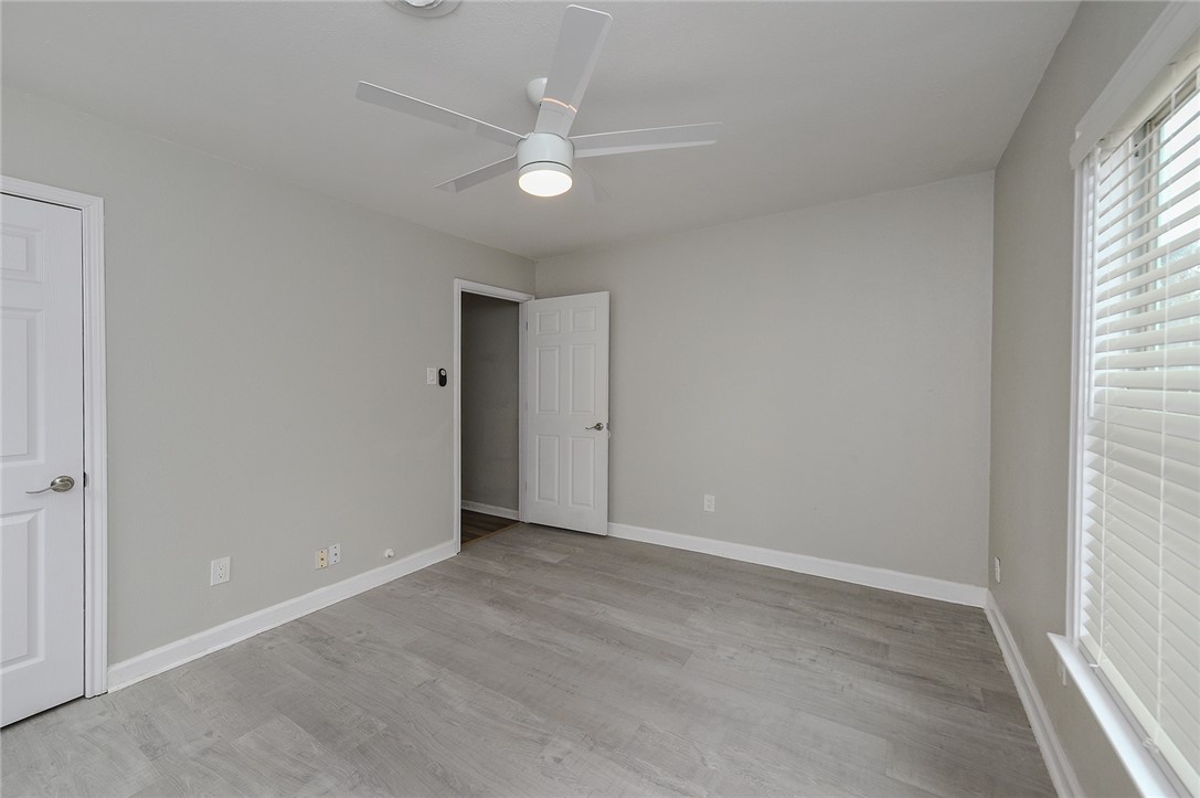 634 Mc Call Street Corpus Christi, TX 78404 - Photo 22 of 34 a view of an empty room with a window