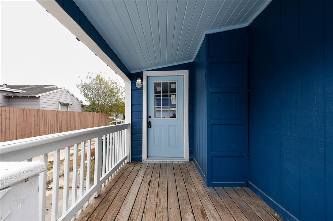 634 Mc Call Street Corpus Christi, TX 78404 - Photo 29 of 34 a view of a balcony with wooden floor