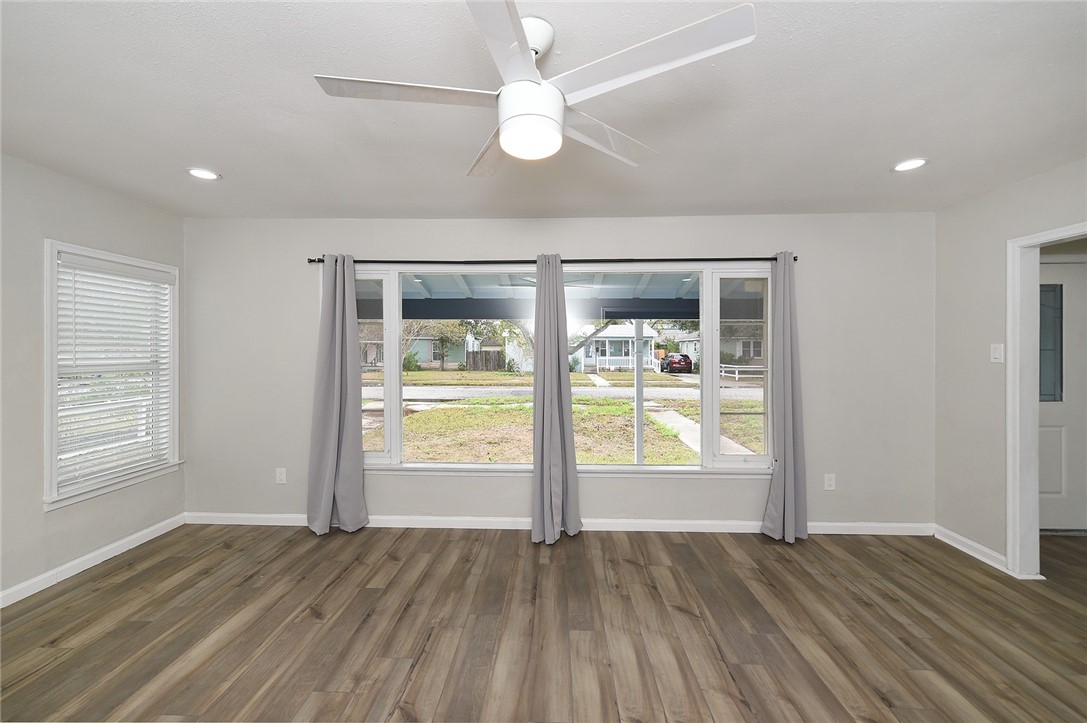 634 Mc Call Street Corpus Christi, TX 78404 - Photo 7 of 34 an empty room with window and wooden floor