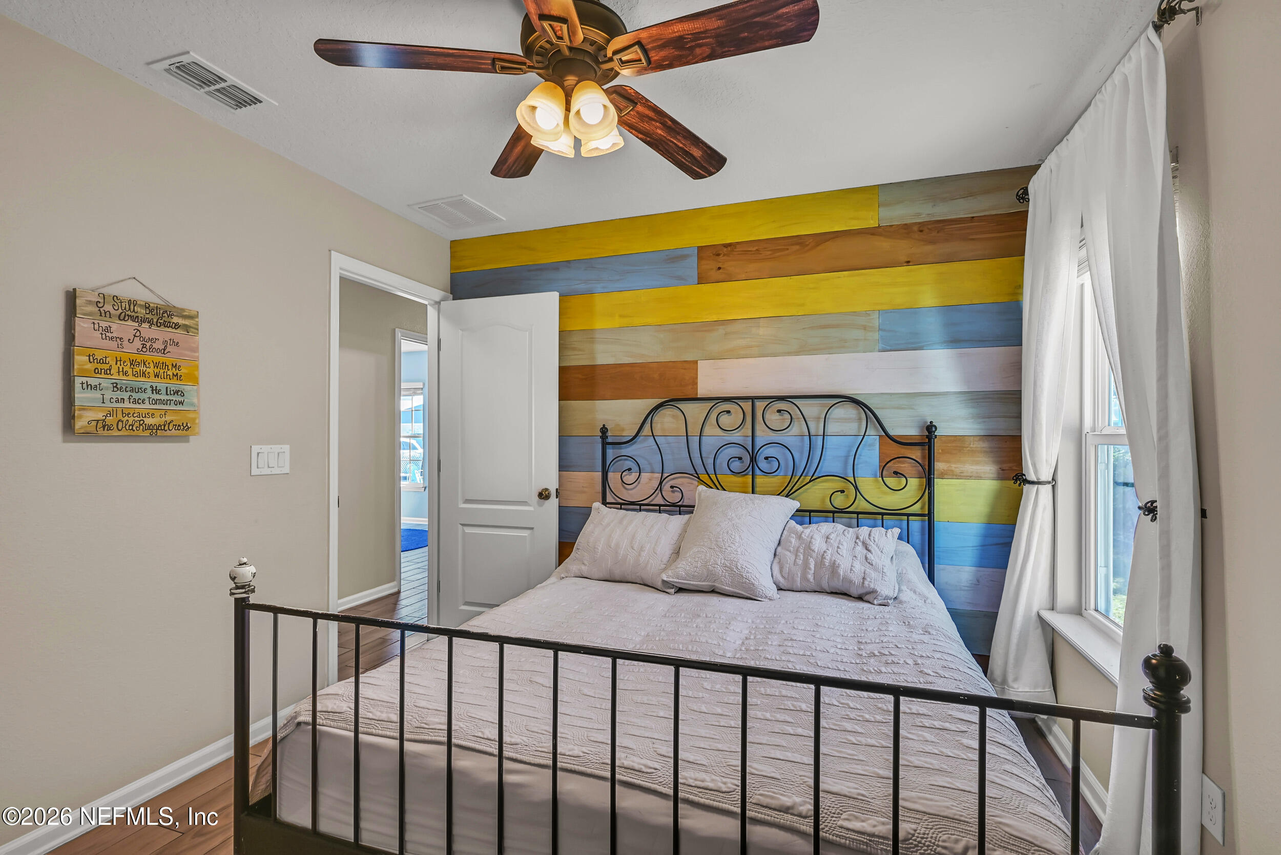 532 Bluejack Lane St. Augustine, FL 32095 - Photo 23 of 55 a bedroom with a bed and a large window