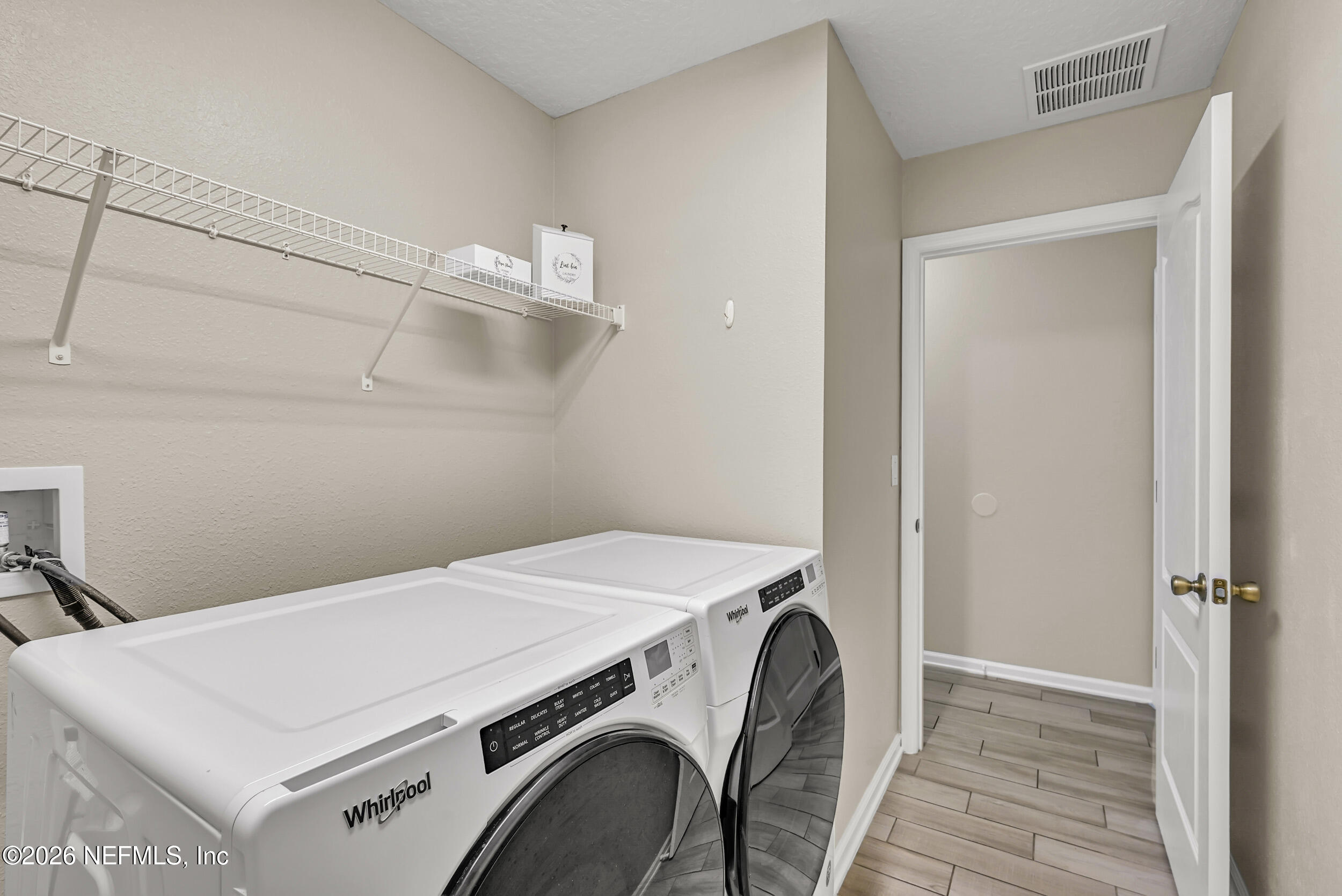 532 Bluejack Lane St. Augustine, FL 32095 - Photo 28 of 55 a utility room with dryer and washer