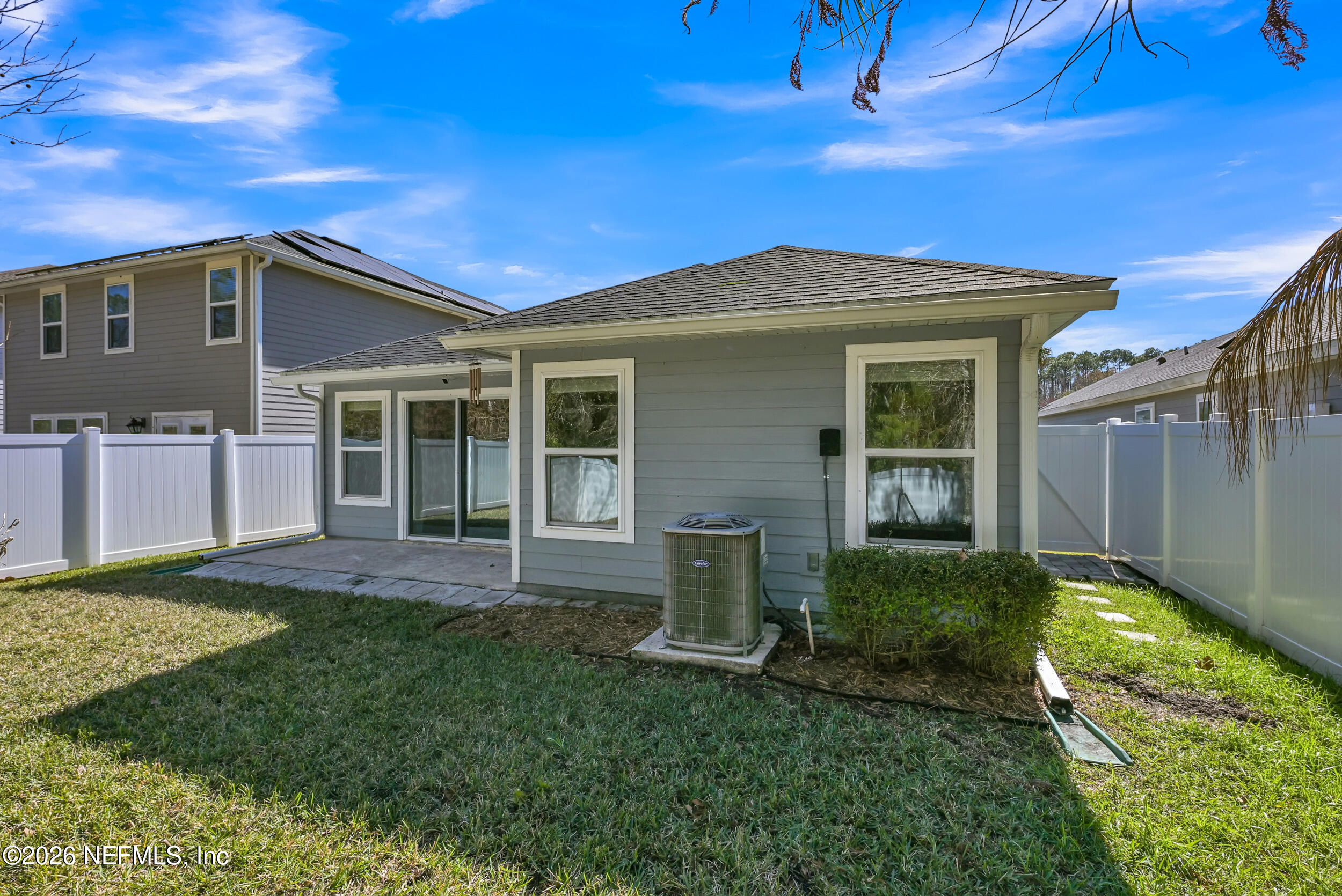 532 Bluejack Lane St. Augustine, FL 32095 - Photo 30 of 55 a view of a house with a yard
