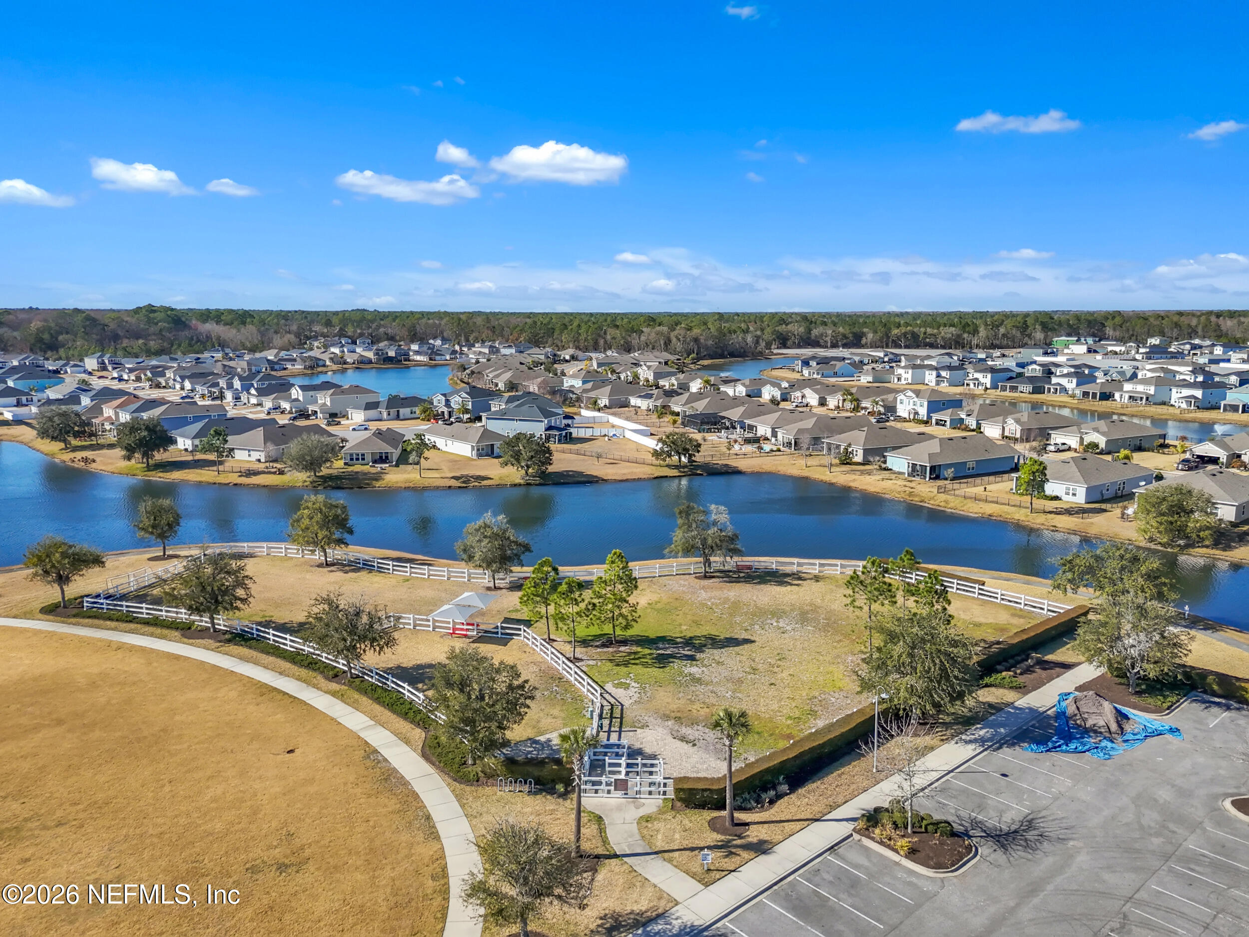 532 Bluejack Lane St. Augustine, FL 32095 - Photo 53 of 55 a view of a terrace with wooden floor and city view