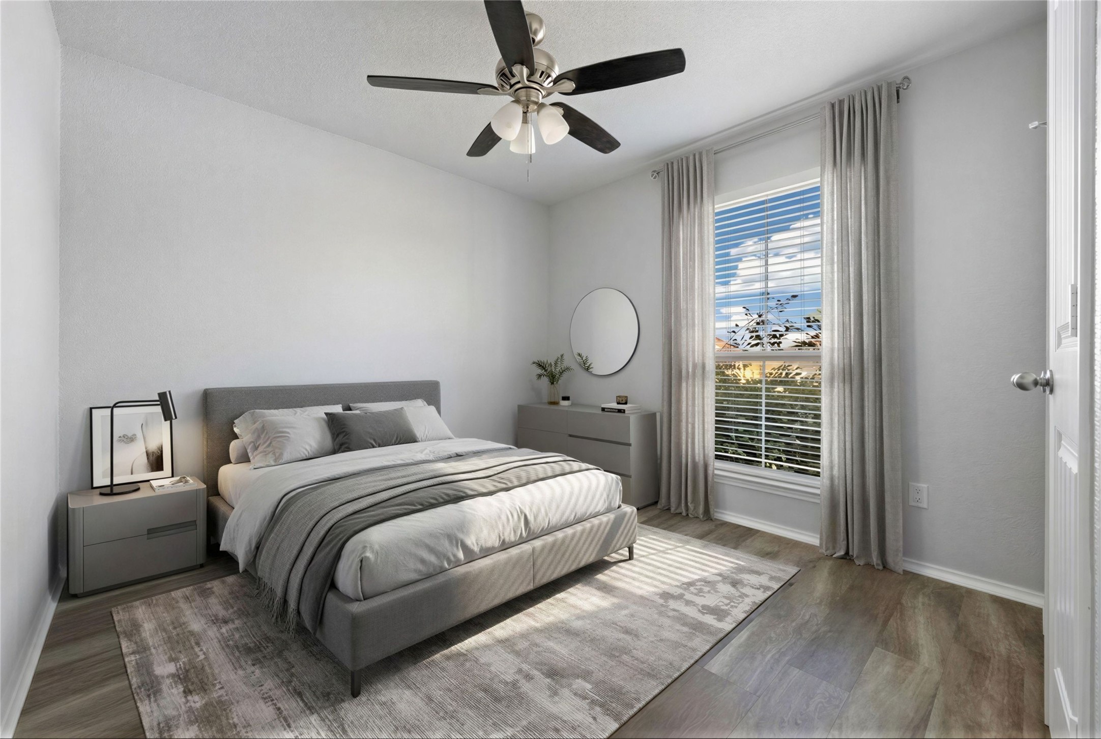 133 Beth Ann Loop Taylor, TX 76574 - Photo 15 of 30 Virtual stage Front bedroom #2 with light dark engineering flooring floors and ceiling fan