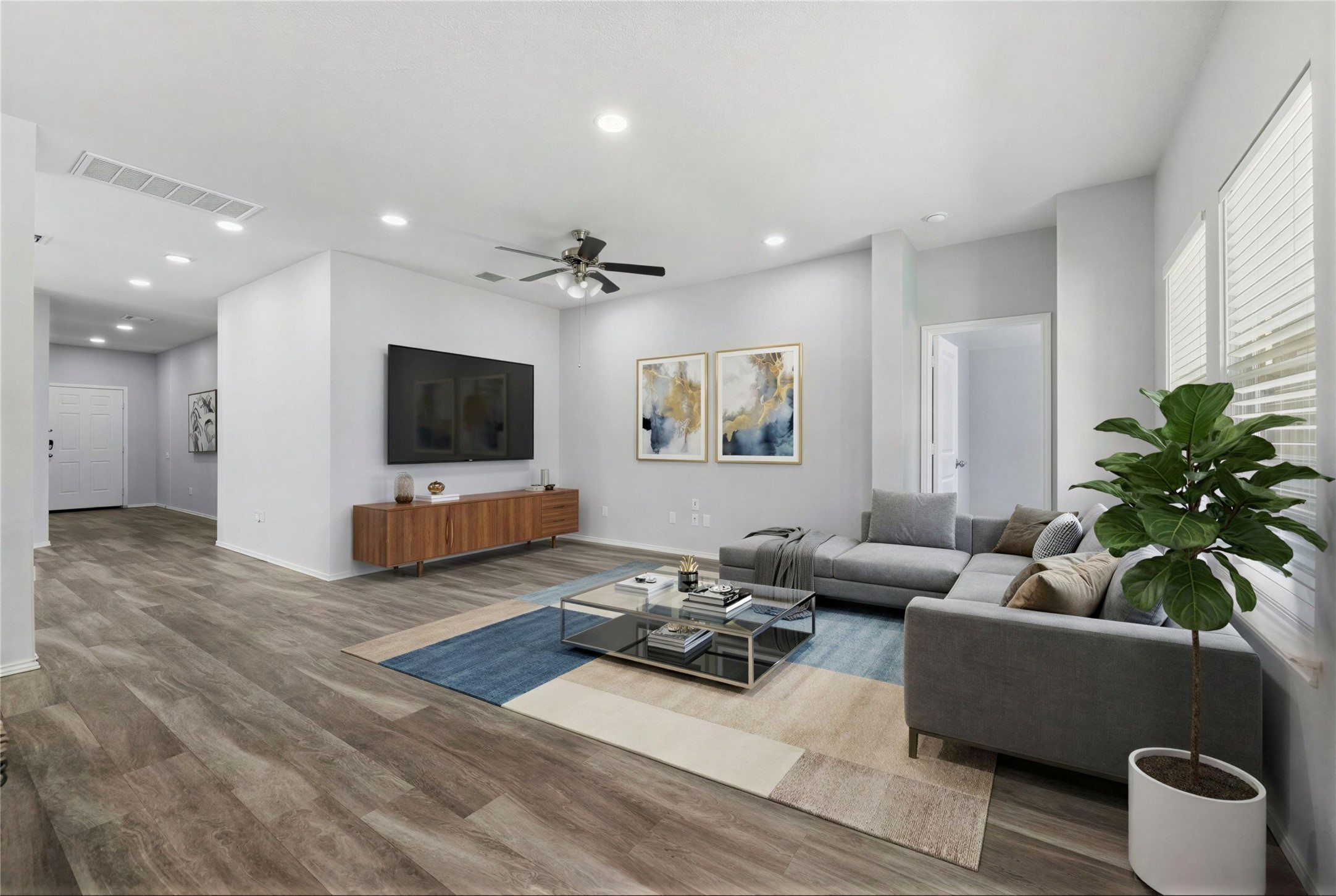 133 Beth Ann Loop Taylor, TX 76574 - Photo 5 of 30 Virtual stage-Living room with wood finished floors, recessed lighting, and a ceiling fan