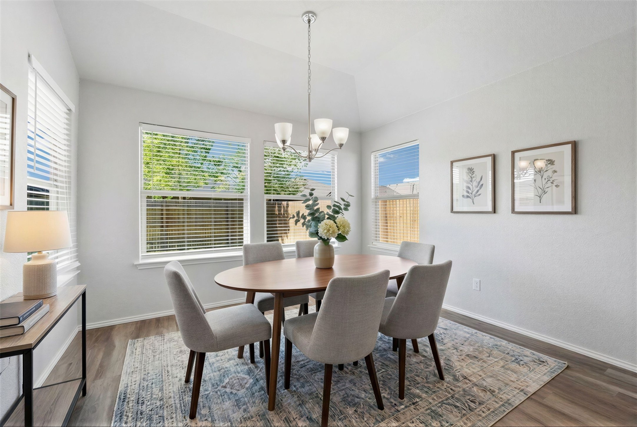 133 Beth Ann Loop Taylor, TX 76574 - Photo 7 of 30 Virtual stage-Dining room featuring vaulted ceiling, a chandelier, dark engineering flooring