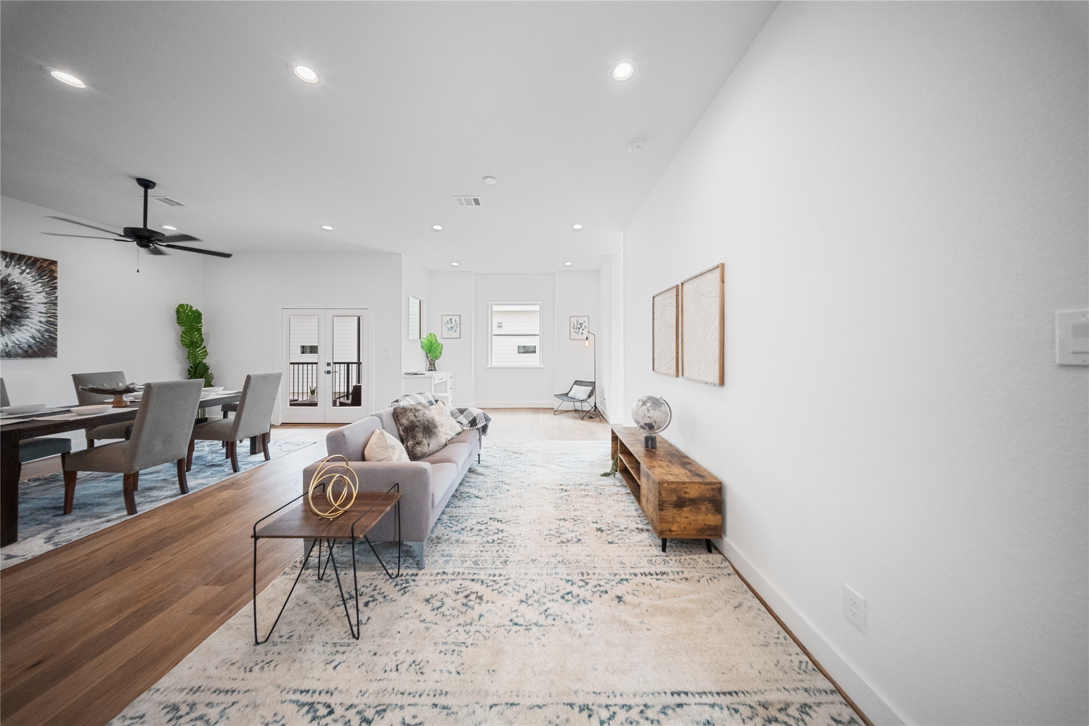 1112 Hogan Street Houston, TX 77009 - Photo 5 of 31 a living room with furniture and a rug