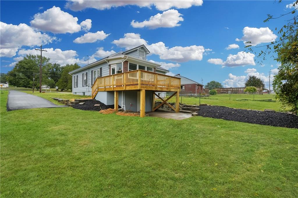 1430 Old Butler Road New Castle, PA 16101 - Photo 27 of 31 a view of a big house with a big yard