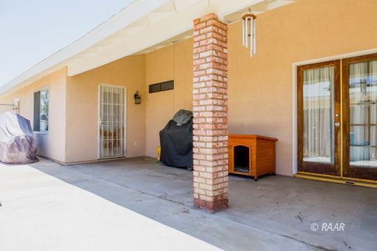 315 Henry Street Ridgecrest, CA 93555 - Photo 27 of 27 a view of a bedroom with windows