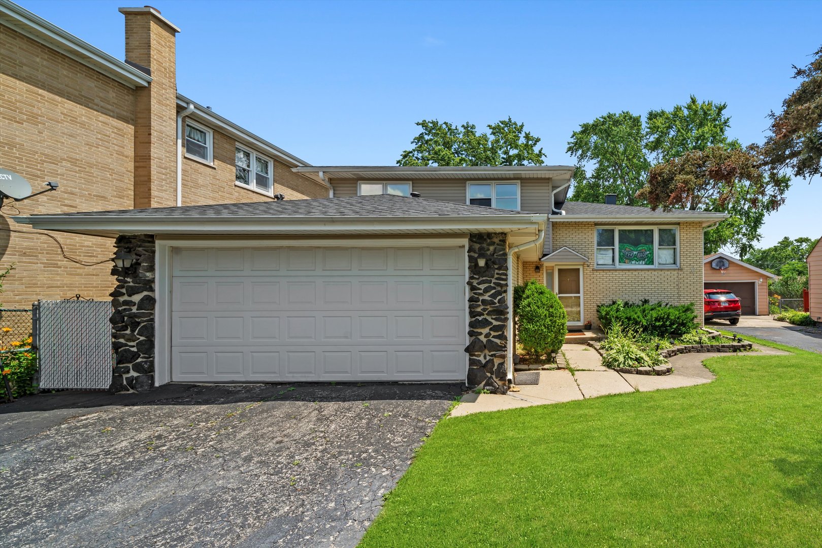 10529 Lyman Avenue Chicago Ridge, IL 60415 - Photo 1 of 45 front view of a house with a yard