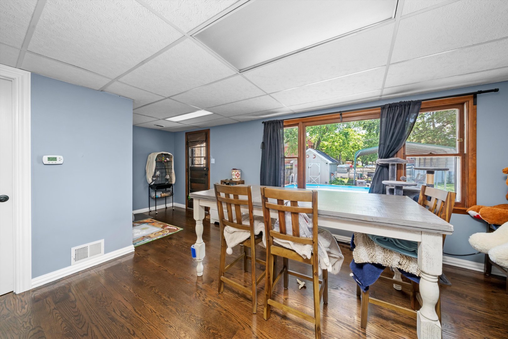 10529 Lyman Avenue Chicago Ridge, IL 60415 - Photo 13 of 45 a view of a dining room with furniture window and wooden floor