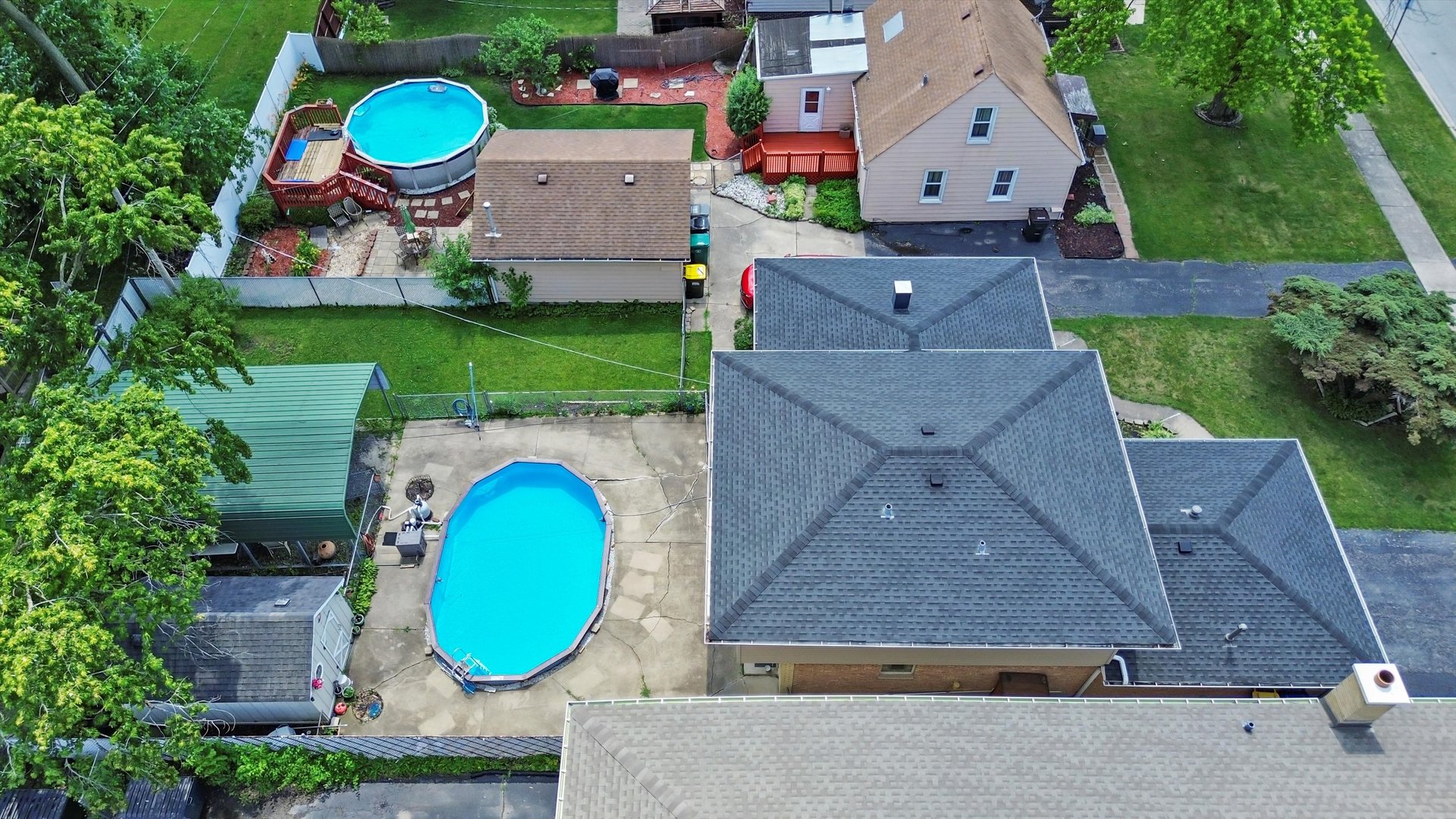 10529 Lyman Avenue Chicago Ridge, IL 60415 - Photo 6 of 45 an aerial view of a house with a swimming pool outdoor seating and yard