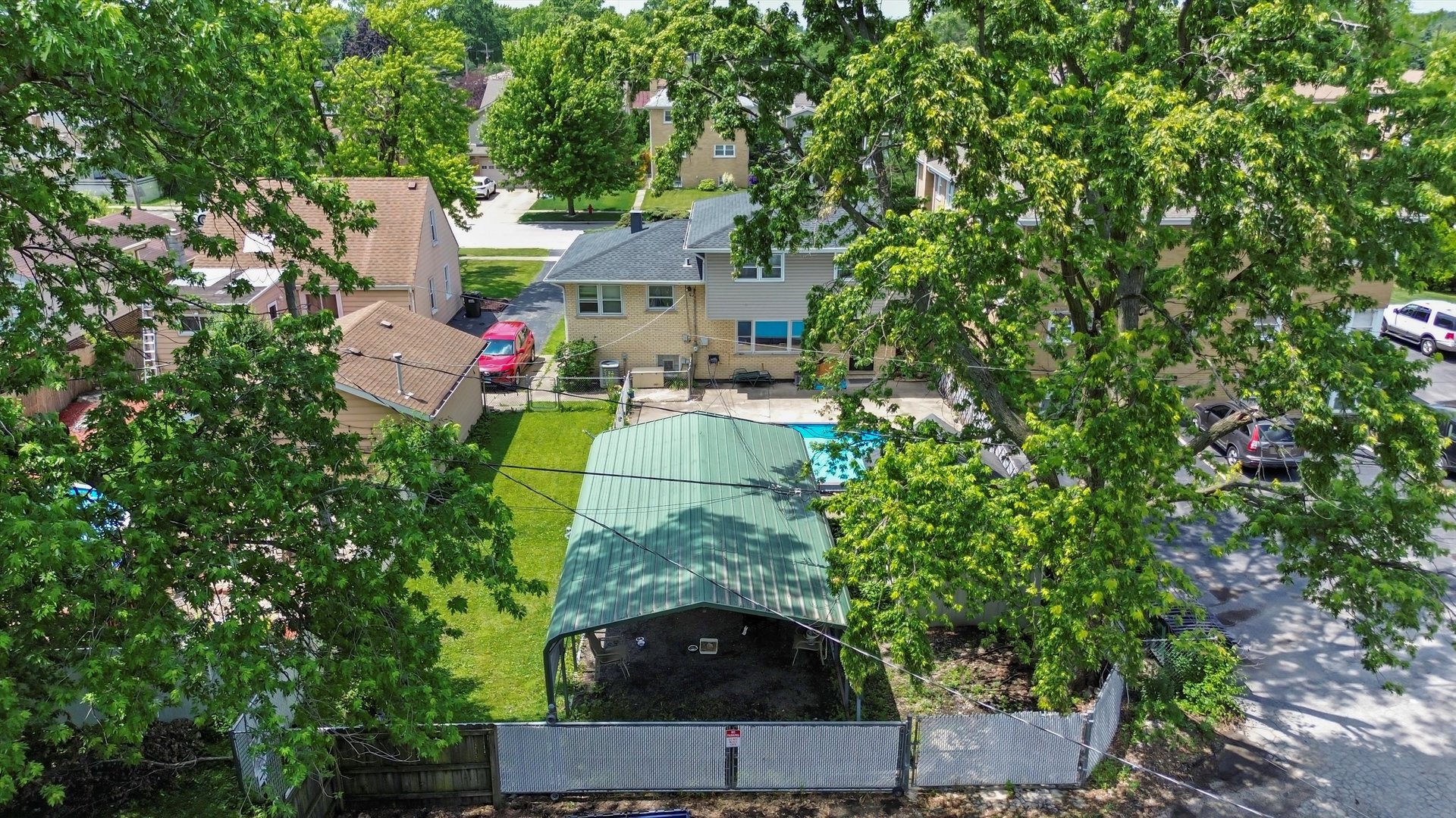 10529 Lyman Avenue Chicago Ridge, IL 60415 - Photo 8 of 45 an aerial view of a house with swimming pool and garden
