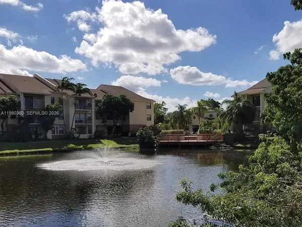 a view of a lake with houses