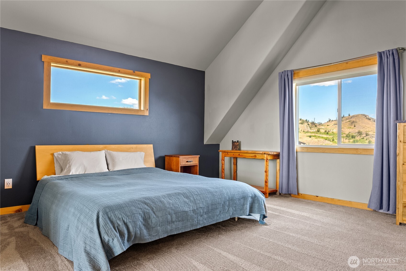 30 Shalberg Lake Road Riverside, WA 98849 - Photo 15 of 40 a bedroom with a bed and painting on the wall