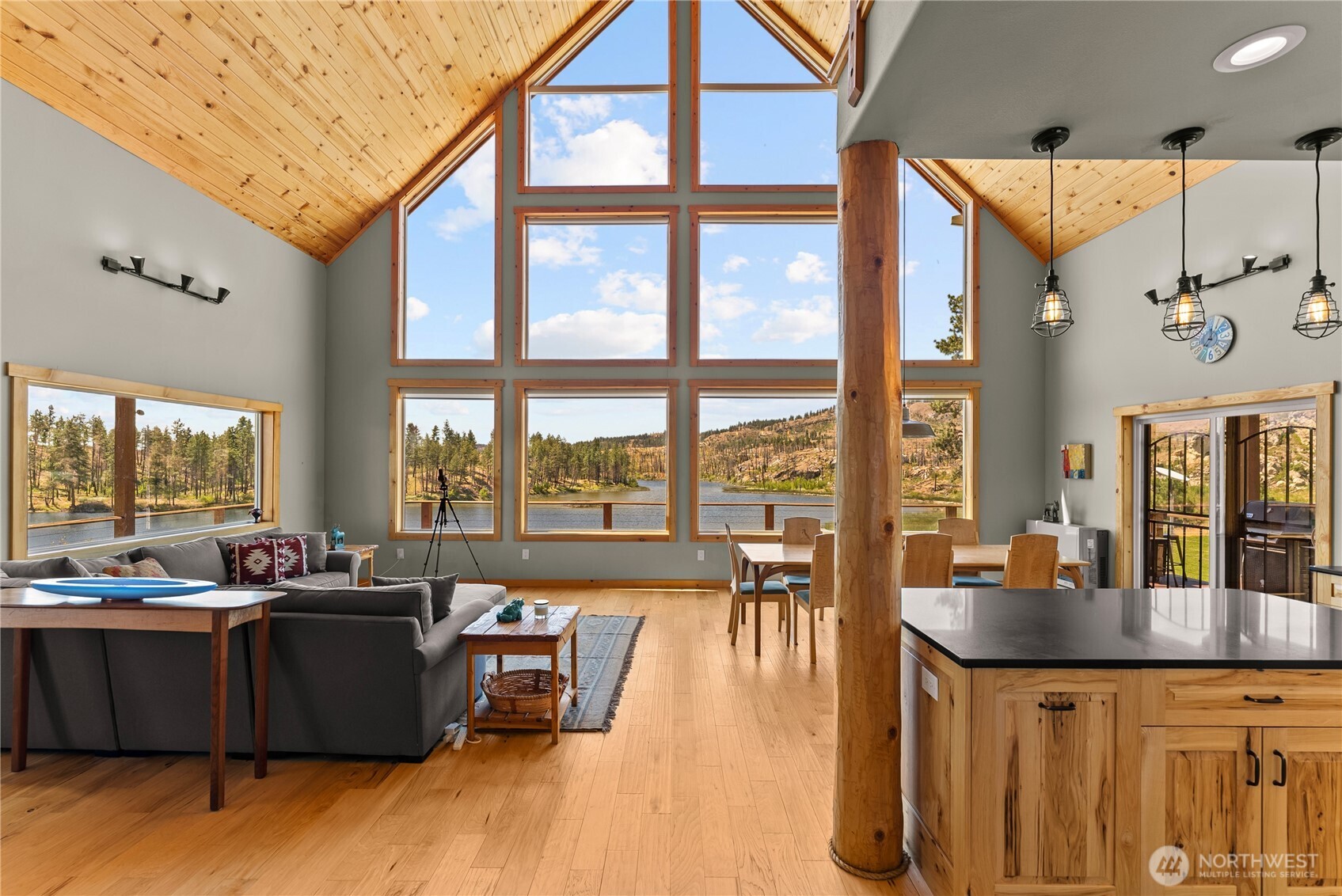 30 Shalberg Lake Road Riverside, WA 98849 - Photo 3 of 40 a living room with furniture and floor to ceiling windows