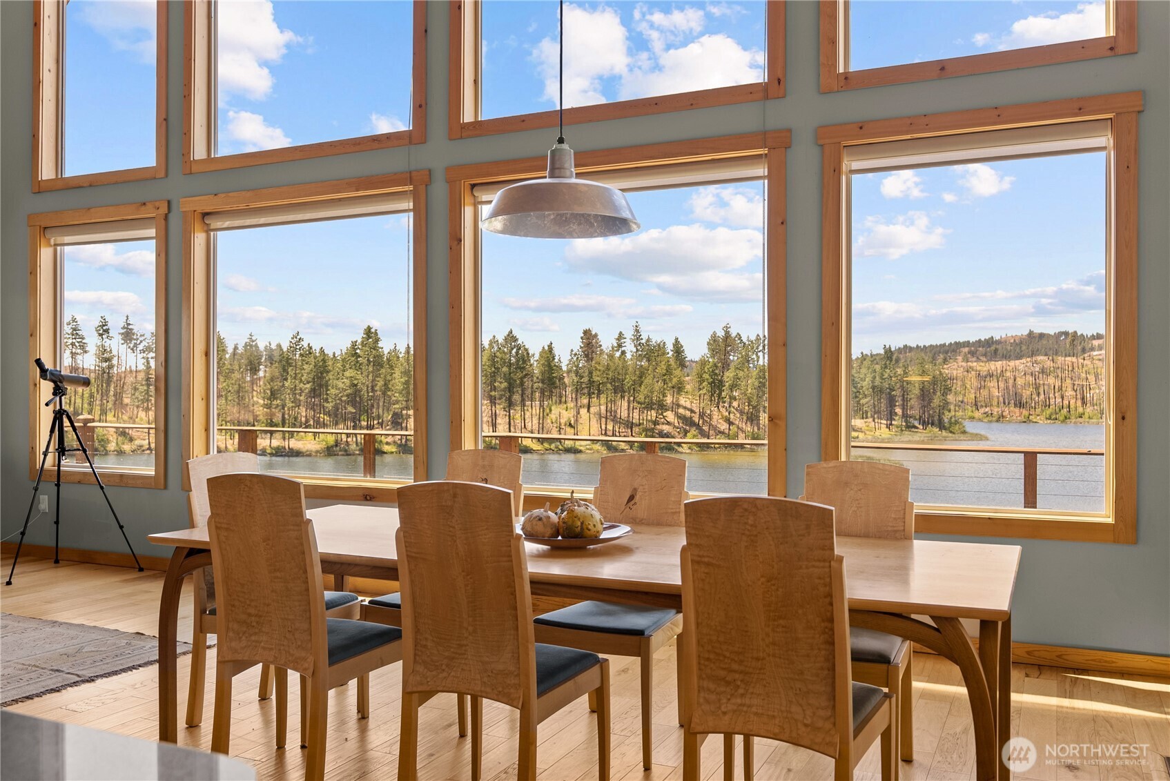 30 Shalberg Lake Road Riverside, WA 98849 - Photo 10 of 40 a dining room with furniture large windows and a livingroom