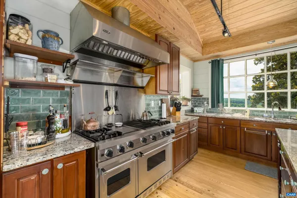 a kitchen with sink and window