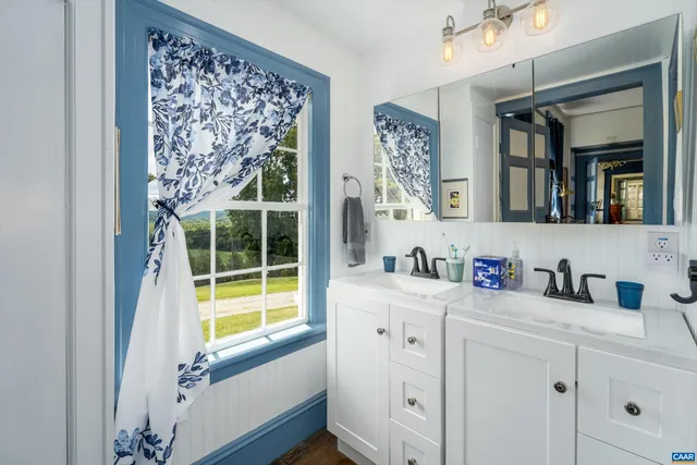 a bed room with a bed and furniture