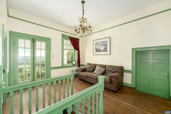 a view of a balcony with staircase